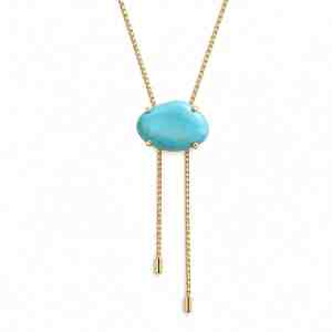 Gold bolo necklace with a large turquoise-colored oval centerpiece and two hanging chain ends.