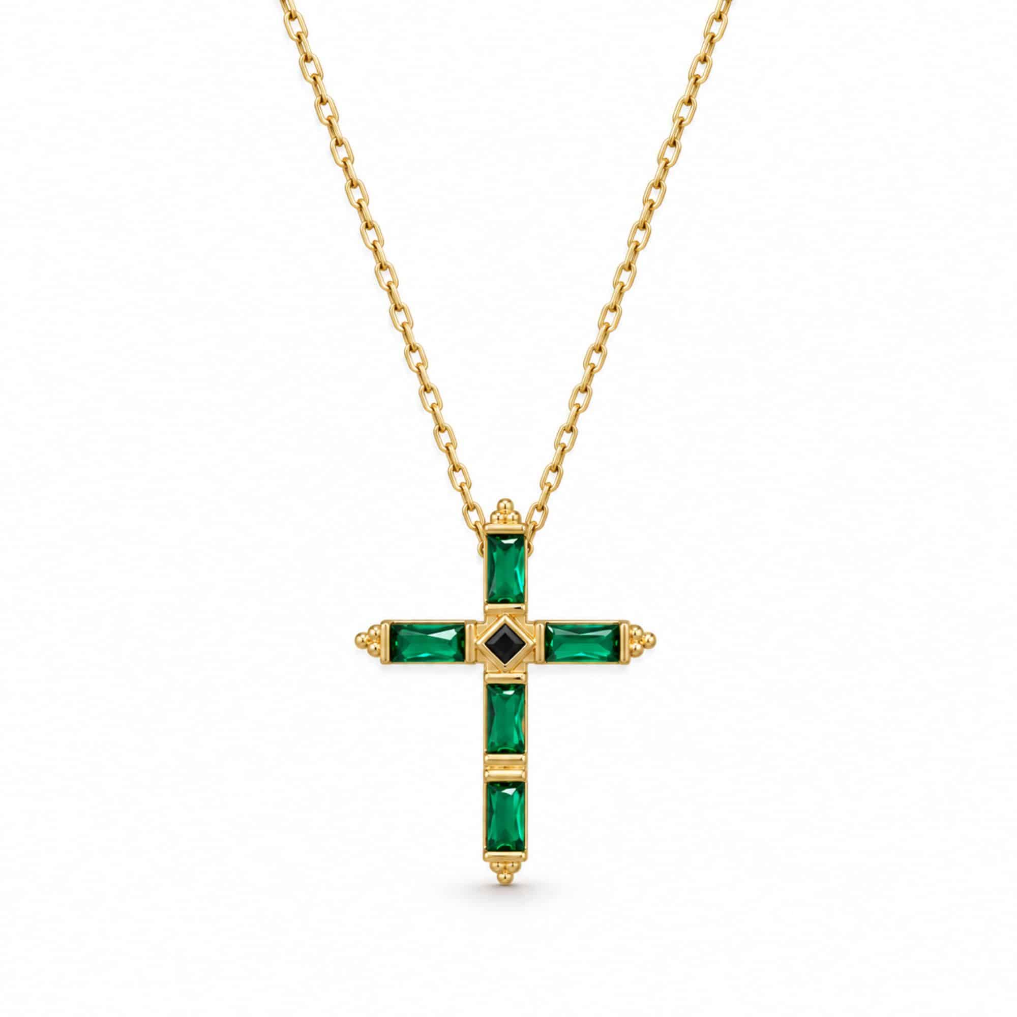 Gold-plated cross necklace with green baguette CZs and black center stone