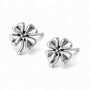 Pair of oxidized sterling silver four-leaf clover stud earrings on a white background