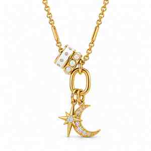 Gold-tone celestial charm necklace with crescent moon, star, white enamel and synthetic opal accents