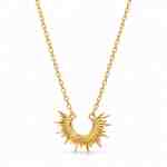 Gold-plated sterling silver necklace with a small open-center sunburst pendant and radiating pointed rays