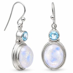 Sterling silver drop earrings with oval rainbow moonstones and small faceted blue topaz stones on French wires.