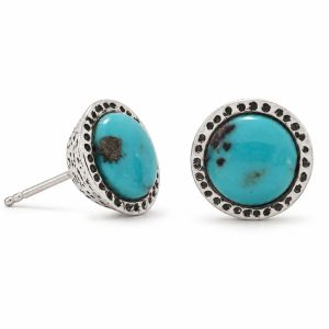 Round turquoise stud earrings with blue-green stones and textured oxidized silver borders.