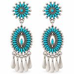 Oxidized silver turquoise chandelier earrings with double sunburst designs and five dangling silver drops.