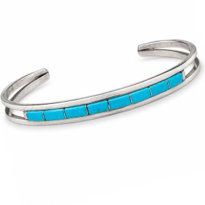 Navajo sterling silver open cuff bracelet with a row of eight rectangular blue Kingman turquoise stones.