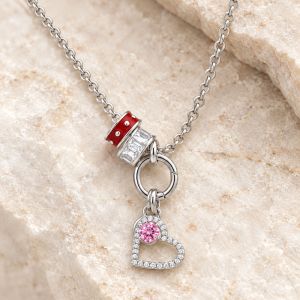 Silver-tone charm necklace with red enamel, clear CZ heart accents, and a round pink CZ charm.